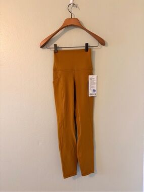 lululemon athletica Align HR 25" Leggings with Pockets in Mustard Gold
